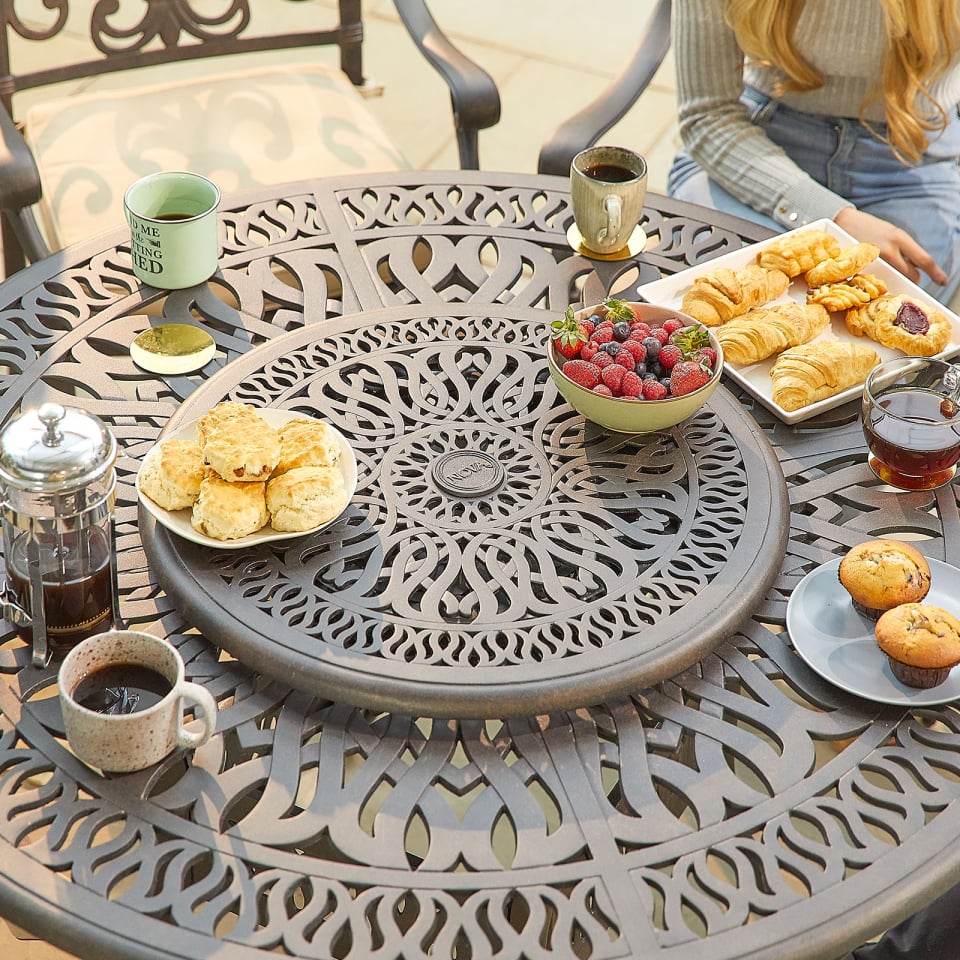 Cotswold 6 Seat Cast Aluminium Dining Set - Round Table in Aged Bronze